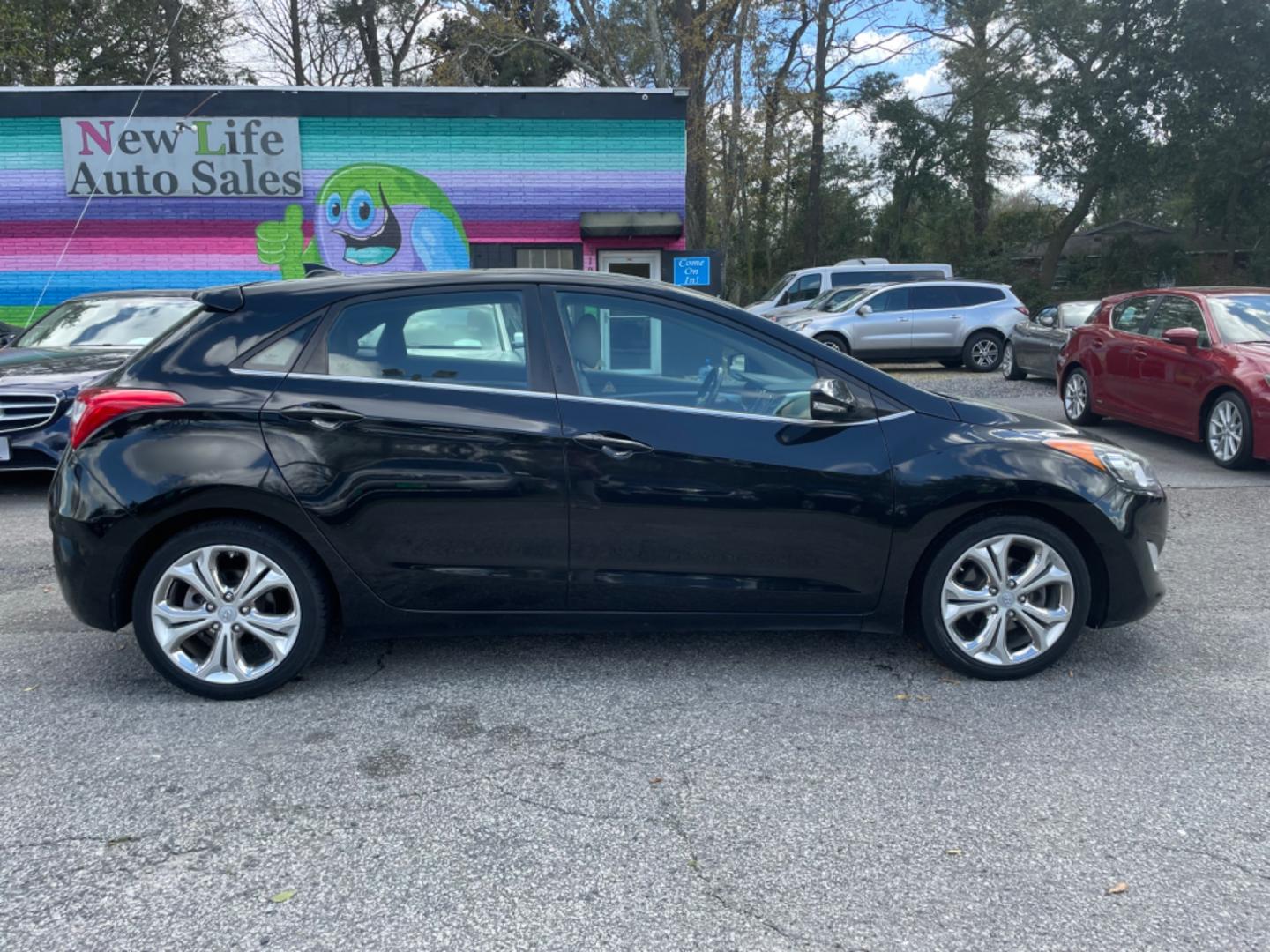 2014 BLACK HYUNDAI ELANTRA GT BASE (KMHD35LH8EU) with an 2.0L engine, Automatic transmission, located at 5103 Dorchester Rd., Charleston, SC, 29418-5607, (843) 767-1122, 36.245171, -115.228050 - Photo#7